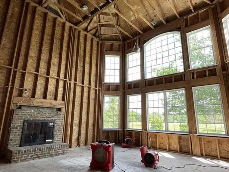 Storm damaged interior stripped to the framing during restoration